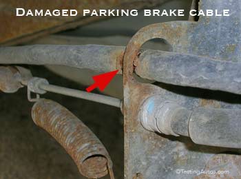 Damaged parking brake cables