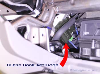 Blend door actuator visible from the glove box opening