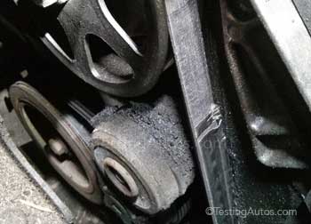 Drive belt damaged by leaking oil