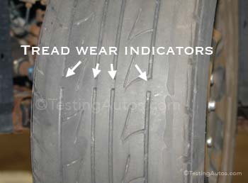 Tire tread worn out to 2/32nds of an inch